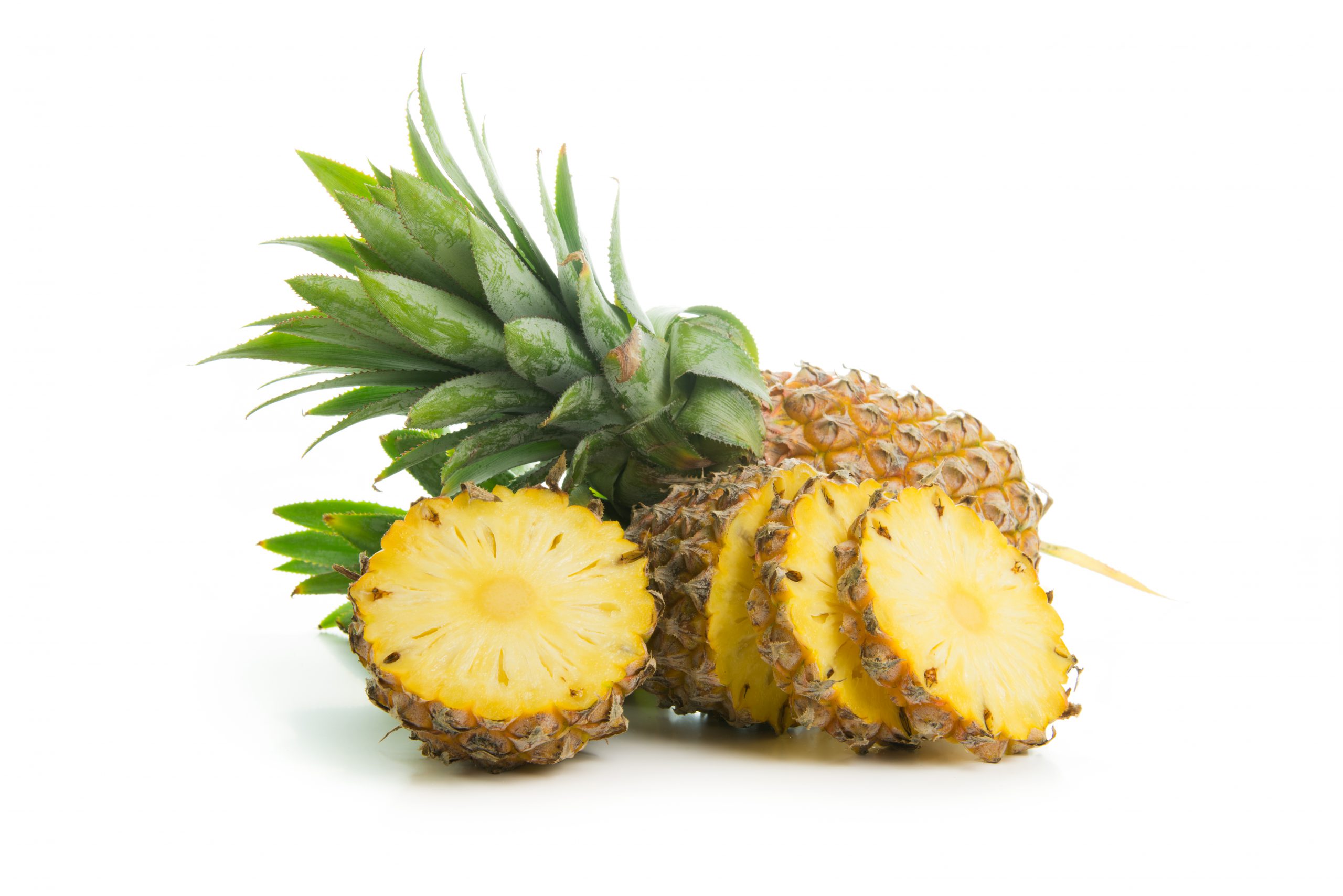 Fresh ripe pineapples isolated on white background